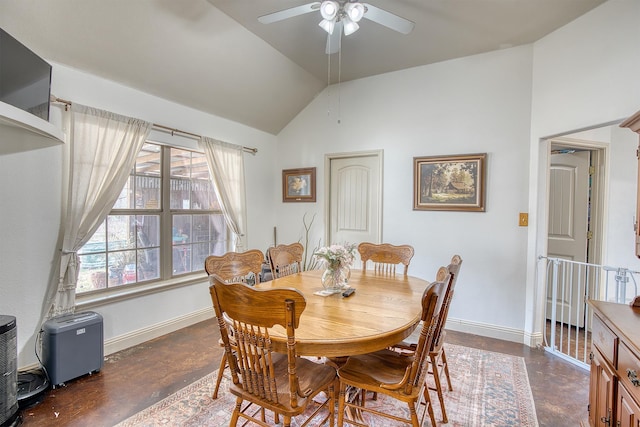 dining room featuring ceiling fan and vaulted ceiling