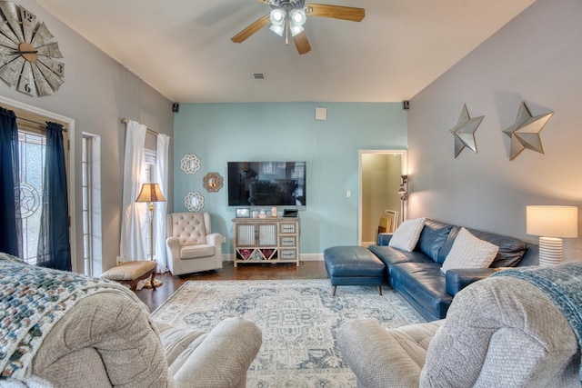 living room featuring ceiling fan and hardwood / wood-style floors