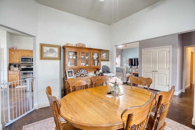 dining room featuring a high ceiling