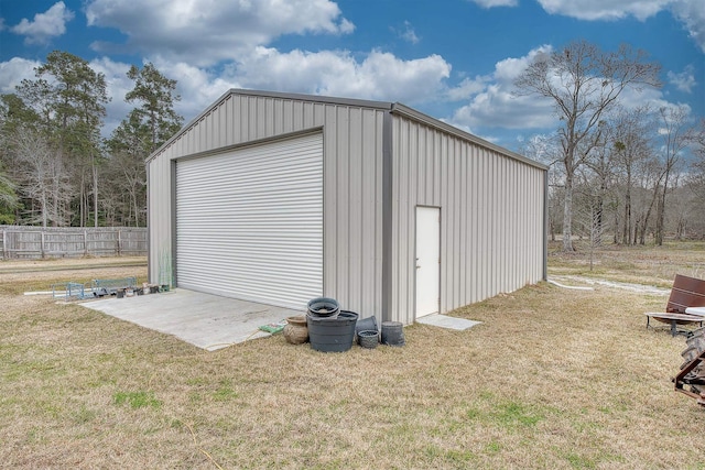 garage featuring a yard