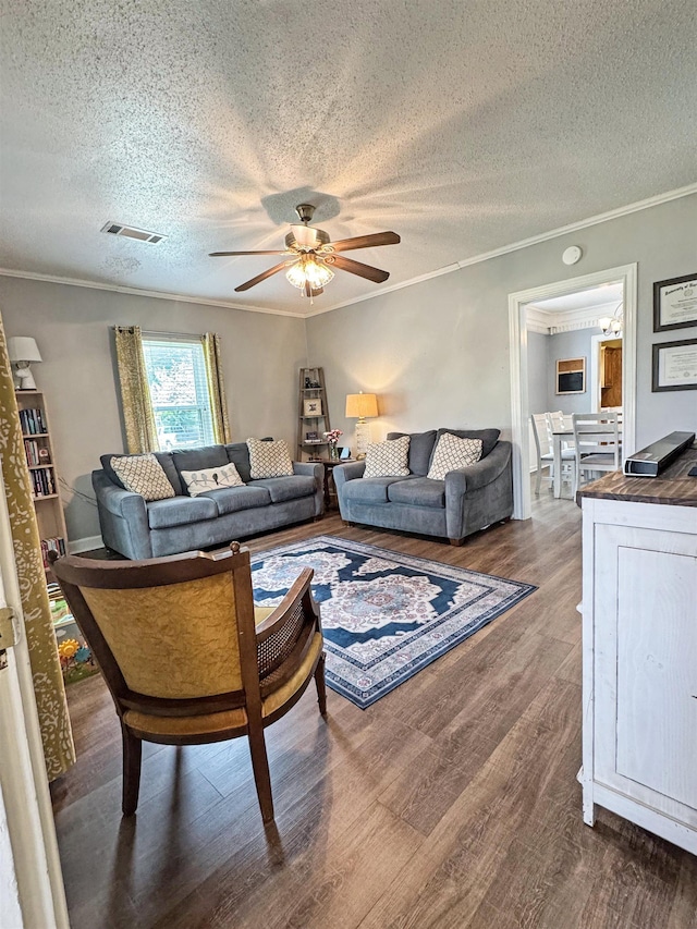 330 Avenue E Ave E, Port Neches, TX 77651 - living room with ornamental molding, a textured ceiling, wood finished floors, and ceiling fan