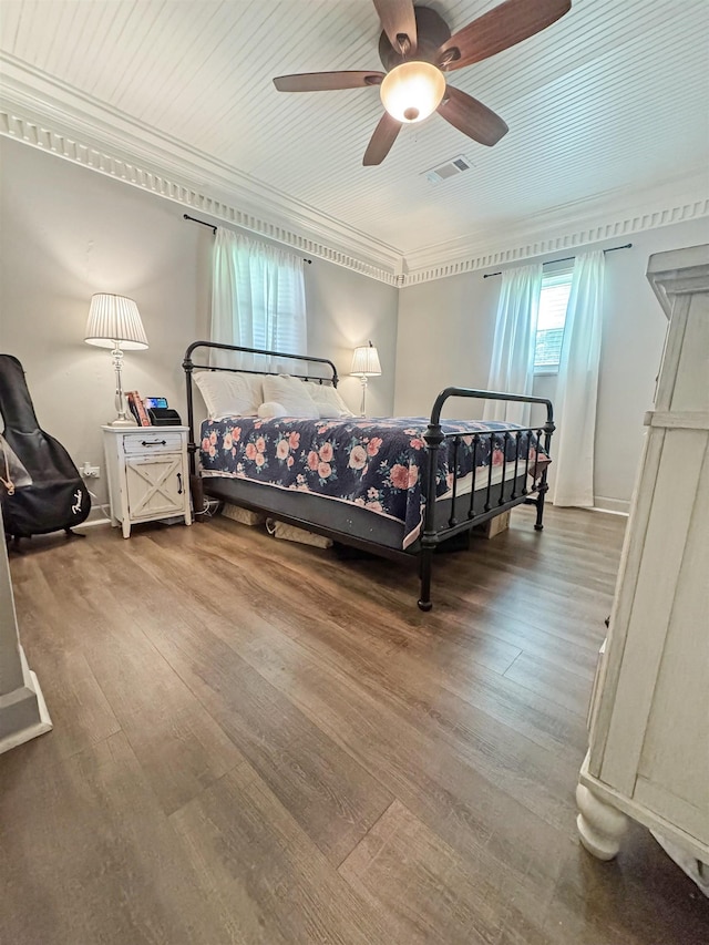 330 Avenue E Ave E, Port Neches, TX 77651 - bedroom featuring wood finished floors, ornamental molding, and ceiling fan