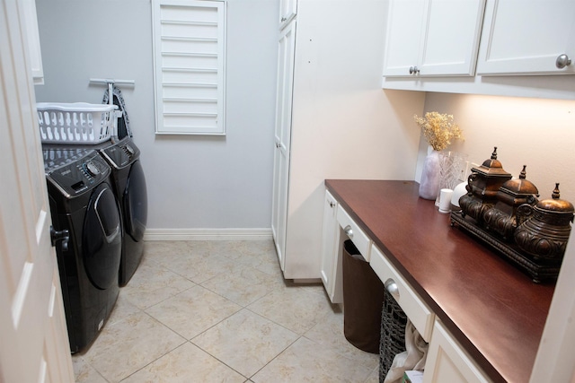 5065 Oakmont Dr, Beaumont, TX 77706 - washroom featuring cabinet space, washing machine and clothes dryer, a desk, and light tile patterned floors