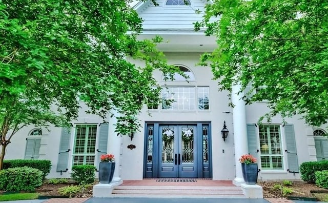 5065 Oakmont Dr, Beaumont, TX 77706 - property entrance featuring french doors and stucco siding