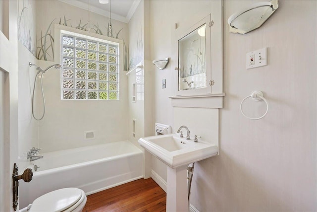 507 Orange Ave, Orange, TX 77630 - bathroom with crown molding, wood finished floors, and  shower combination