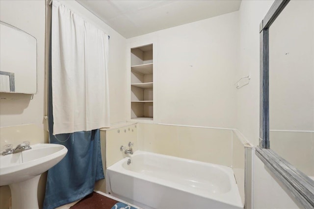 507 Orange Ave, Orange, TX 77630 - bathroom featuring a bath and a sink
