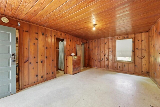 507 Orange Ave, Orange, TX 77630 - unfurnished room with wooden ceiling and wooden walls