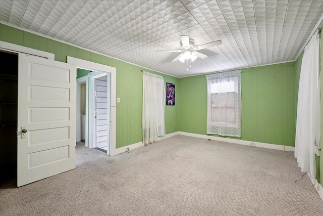 507 Orange Ave, Orange, TX 77630 - unfurnished bedroom with carpet floors and a ceiling fan