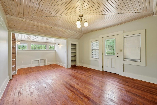 507 Orange Ave, Orange, TX 77630 - unfurnished room with hardwood / wood-style floors, wood ceiling, and a chandelier