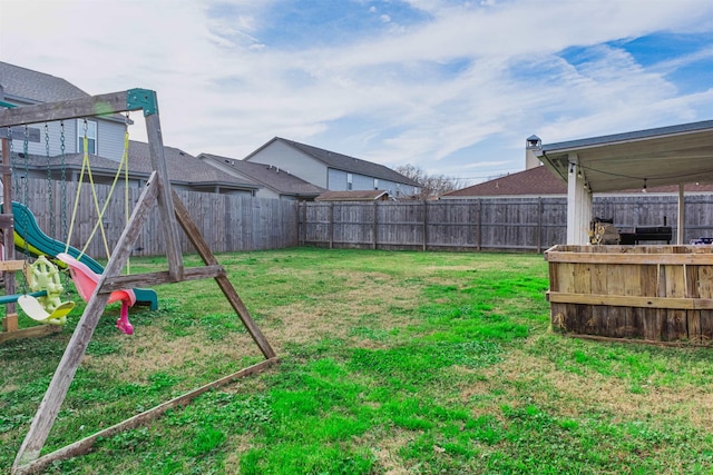 view of yard with a playground