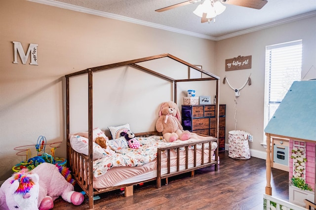 bedroom featuring crown molding, ceiling fan, and dark hardwood / wood-style floors