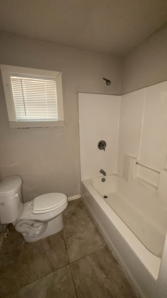 5440 Margo Ln, Beaumont, TX 77708 - full bath featuring baseboards and toilet