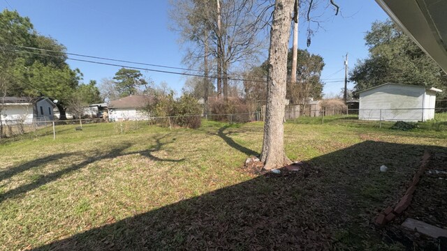 5440 Margo Ln, Beaumont, TX 77708 - view of yard featuring a fenced backyard
