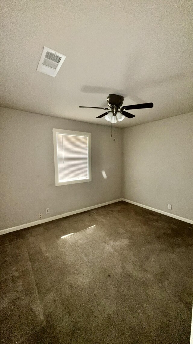 5440 Margo Ln, Beaumont, TX 77708 - unfurnished room with baseboards, a textured ceiling, carpet floors, ceiling fan, and visible vents