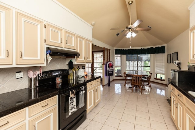 kitchen with black range with electric stovetop, cream cabinetry, light tile patterned flooring, and under cabinet range hood