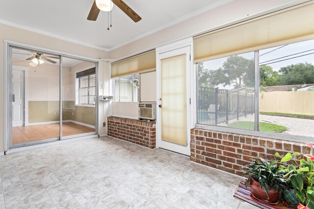 interior space featuring ceiling fan and cooling unit