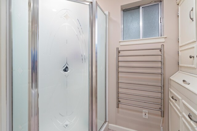 bathroom featuring walk in shower