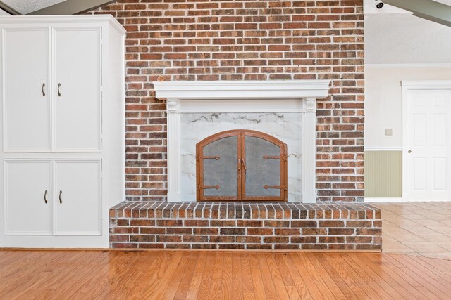 room details featuring hardwood / wood-style flooring and ornamental molding