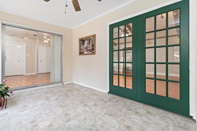 interior space with crown molding, french doors, and ceiling fan