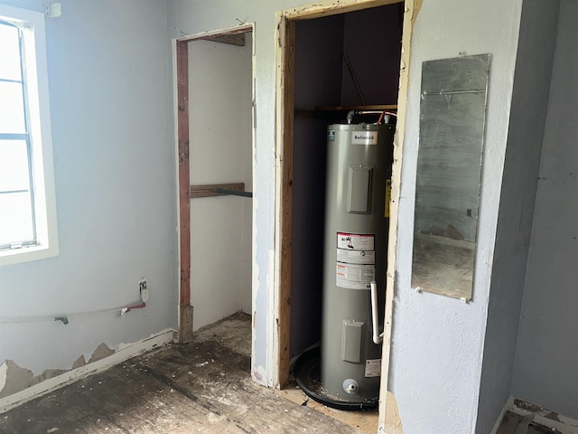 utility room with water heater