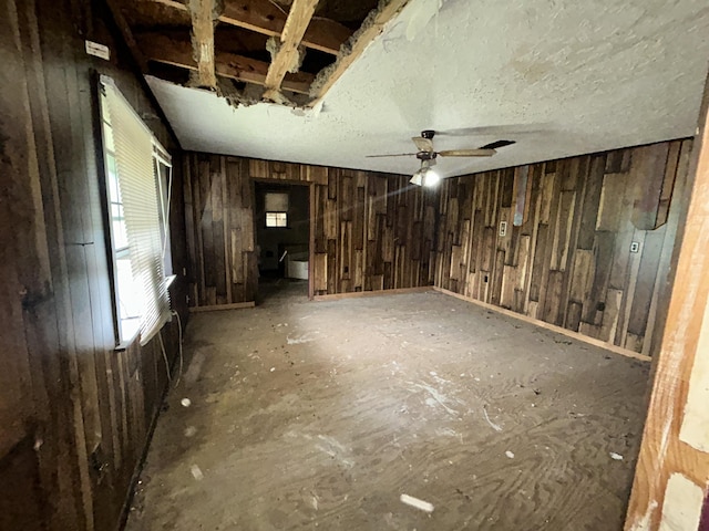 interior space with a ceiling fan