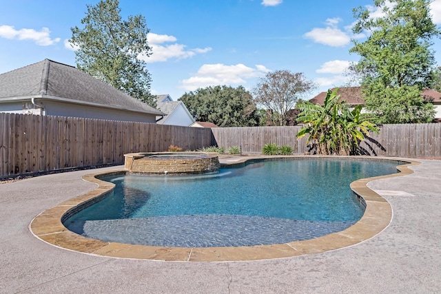 view of pool with pool water feature and an in ground hot tub