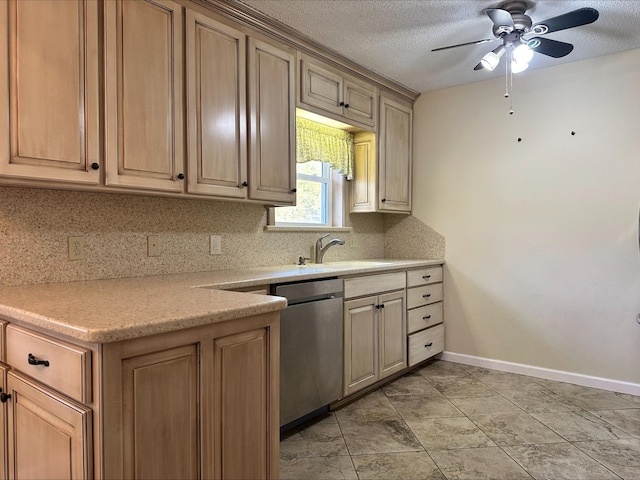 kitchen with sink, backsplash, stainless steel dishwasher, ceiling fan, and a textured ceiling