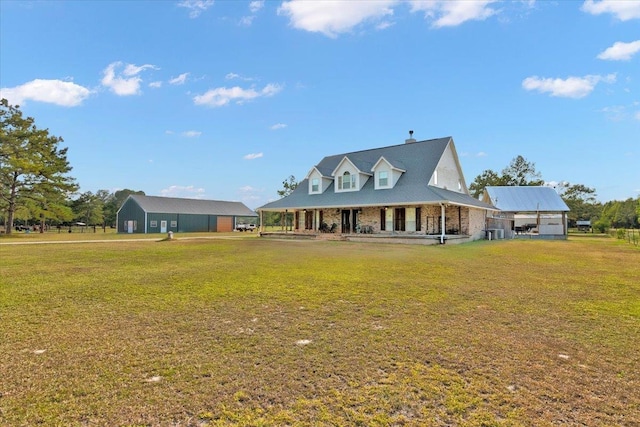 view of front of property featuring cooling unit and a front yard