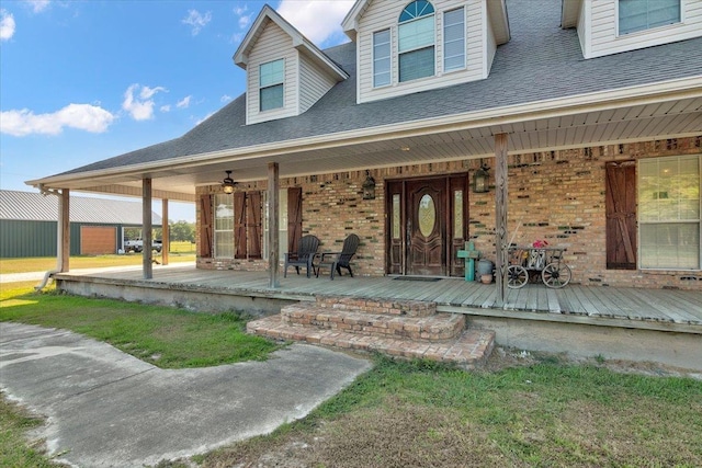 property entrance featuring a porch