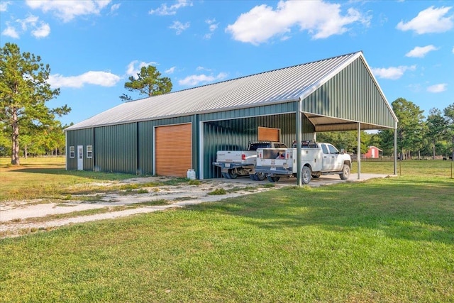 view of outbuilding with a yard