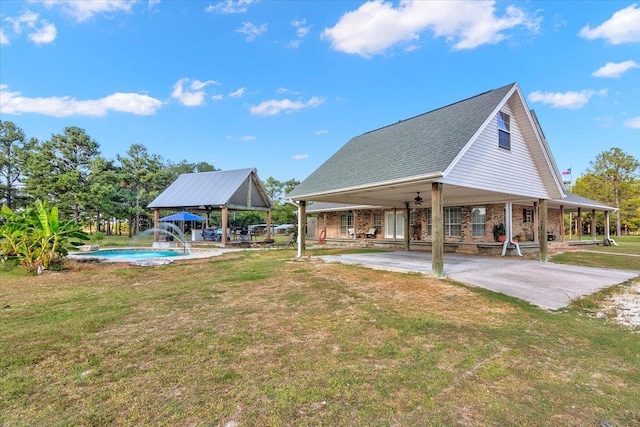 view of property's community with a yard