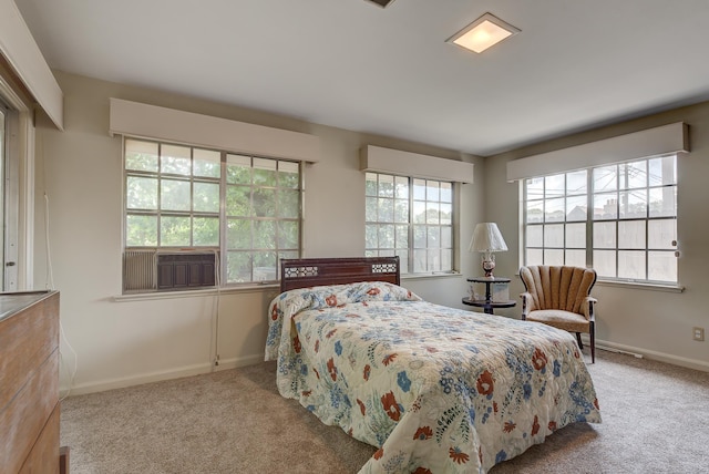 bedroom with light colored carpet