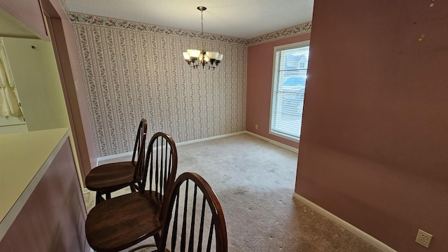 unfurnished dining area with a notable chandelier and light carpet