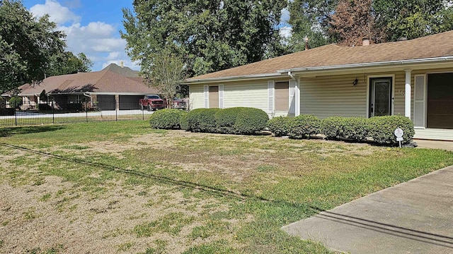 view of property exterior with a lawn