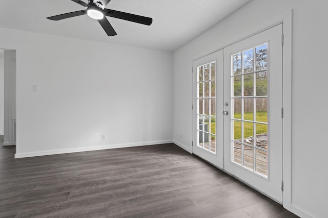 unfurnished room with french doors, ceiling fan, and dark hardwood / wood-style floors