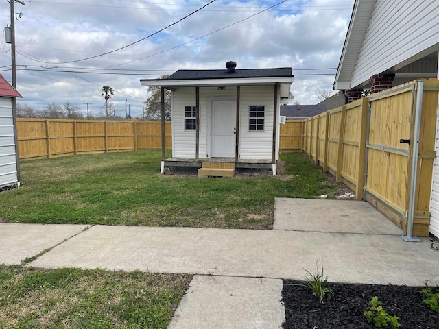 view of outbuilding featuring an outbuilding and a fenced backyard