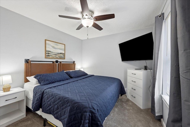 11503 Davidson Rd, Beaumont, TX 77705 - bedroom featuring light colored carpet, ceiling fan, and a textured ceiling
