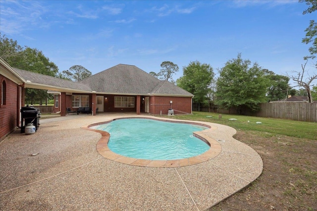 11503 Davidson Rd, Beaumont, TX 77705 - view of swimming pool featuring grilling area, a fenced backyard, and a patio area