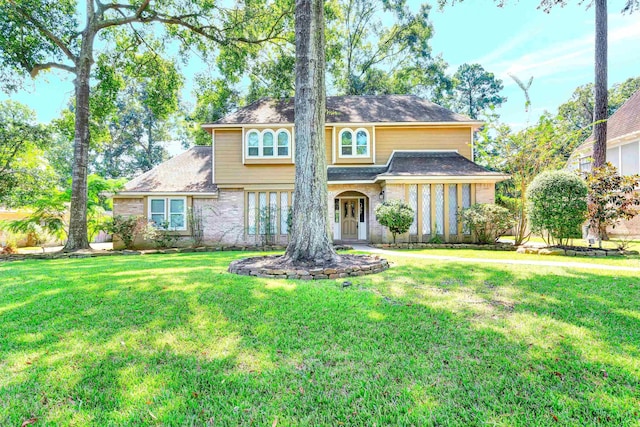 view of front of home with a front yard