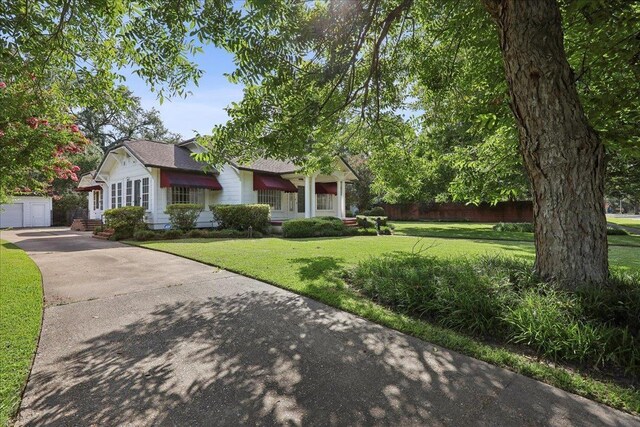 2621 Evergreen Dr, Port Arthur, TX 77642 - view of front facade featuring a garage and driveway