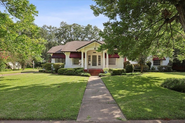 2621 Evergreen Dr, Port Arthur, TX 77642 - bungalow-style house with a front yard