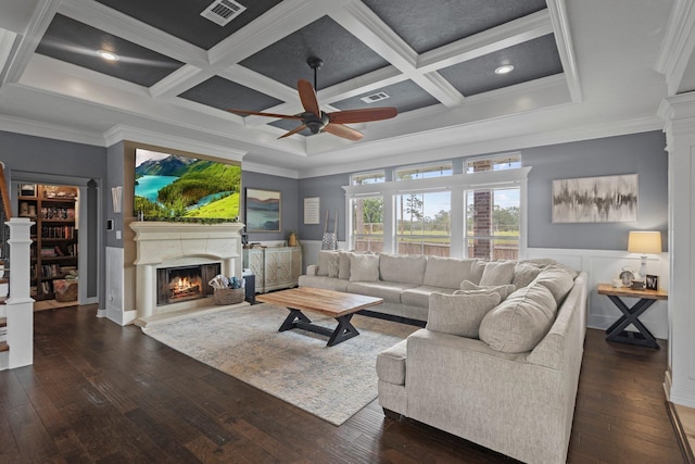 220 Idylwild Dr, Sour Lake, TX 77659 - living room featuring a lit fireplace, a ceiling fan, visible vents, coffered ceiling, and dark wood-type flooring
