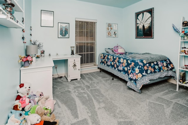 bedroom with light colored carpet