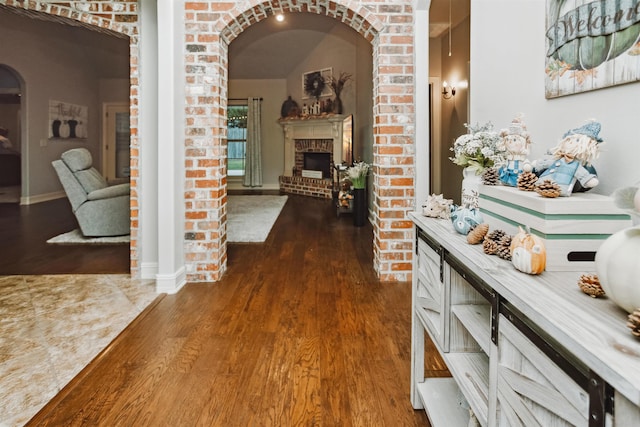 hallway with dark hardwood / wood-style floors