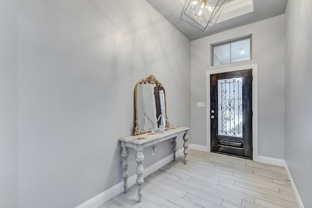 foyer entrance with light wood-type flooring