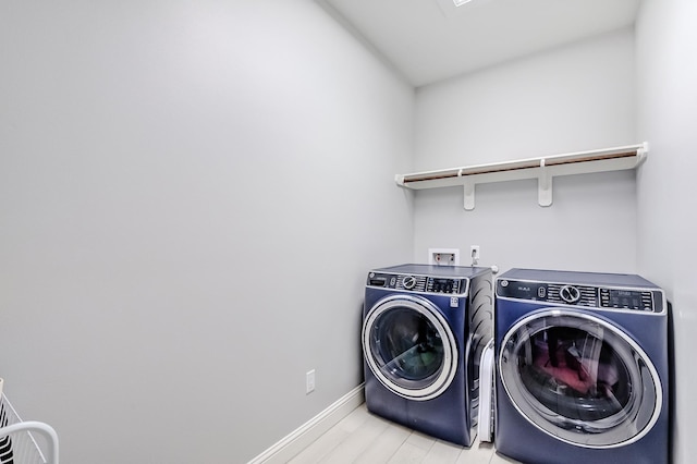 laundry area featuring independent washer and dryer