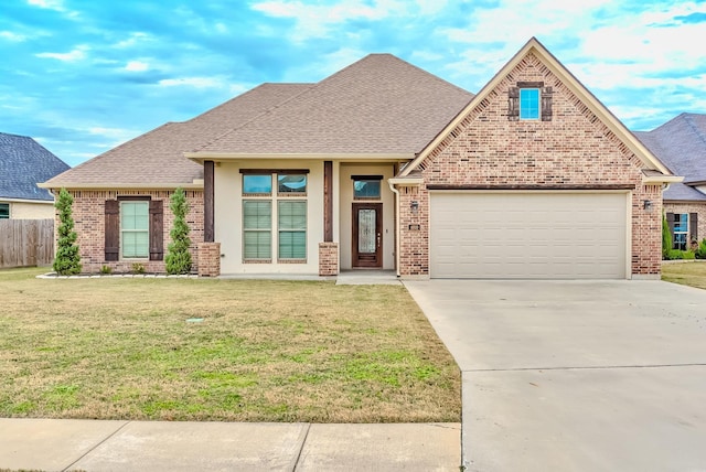 craftsman-style home featuring a front lawn and a garage