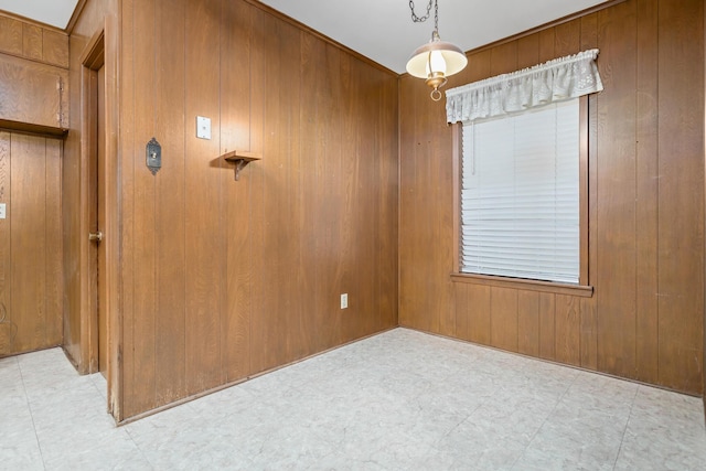 6355 Arrowhead Dr, Beaumont, TX 77707 - unfurnished room featuring light floors and wooden walls