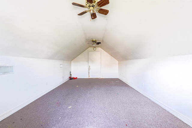 bonus room with carpet flooring, ceiling fan, and vaulted ceiling