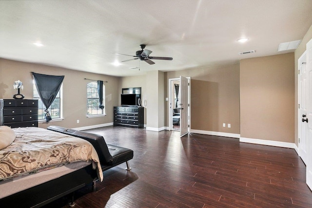 bedroom featuring ceiling fan and dark hardwood / wood-style floors